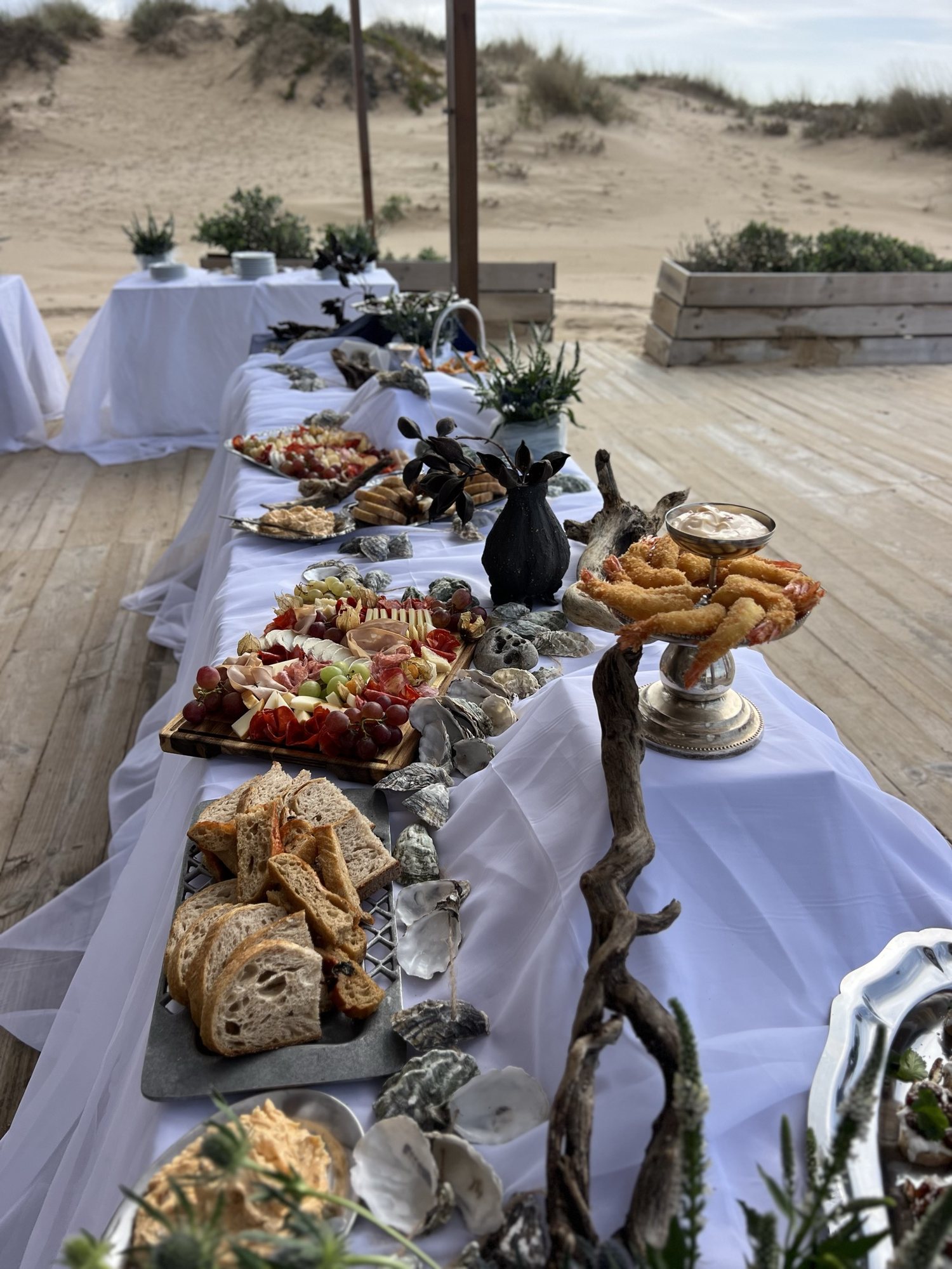 A long table in the dunes